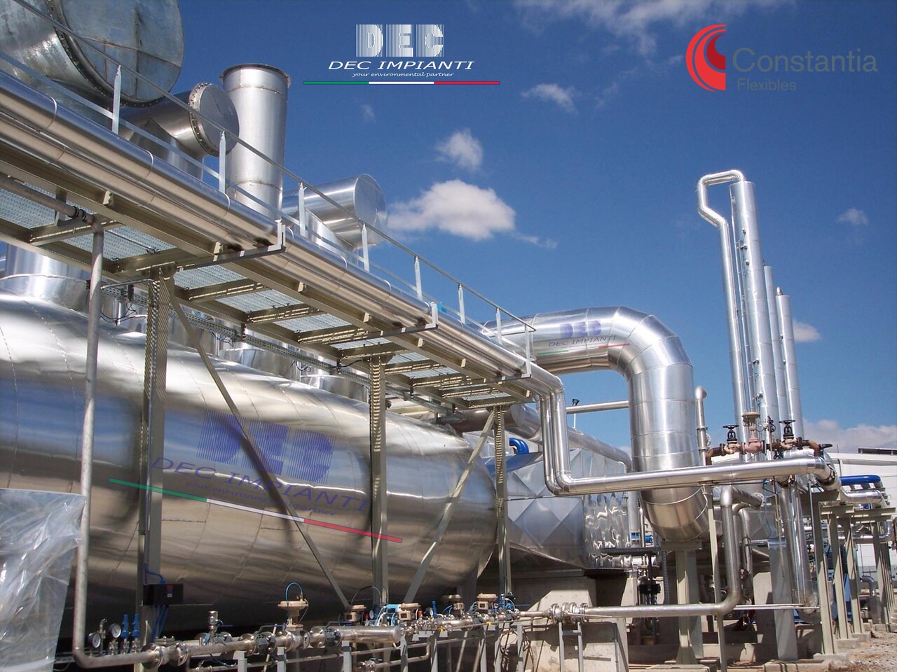 DEC.CBS™ - solvent recovery system, activated carbon, nitrogen regeneration (RSG™ process), installed at a large flexible packaging site (Constantia Flexibles, EMEA) • DEC IMPIANTI S.p.A. Activated carbon solvent recovery, Nitrogen regeneration, Solvent recovery, Activated carbon, VOC recovery, Air purification, Air filtration, Industrial air pollution control, VOC emission control, Environmental sustainability, Green technology, Nitrogen regeneration, Inert gas regeneration, Thermal swing adsorption, Carbon bed regeneration, Solvent desorption, Solvent condensation, Solvent recovery system, Solvent recovery unit, Solvent recovery plant, RSG, RSX, SRU, SRS, SRP, in situ